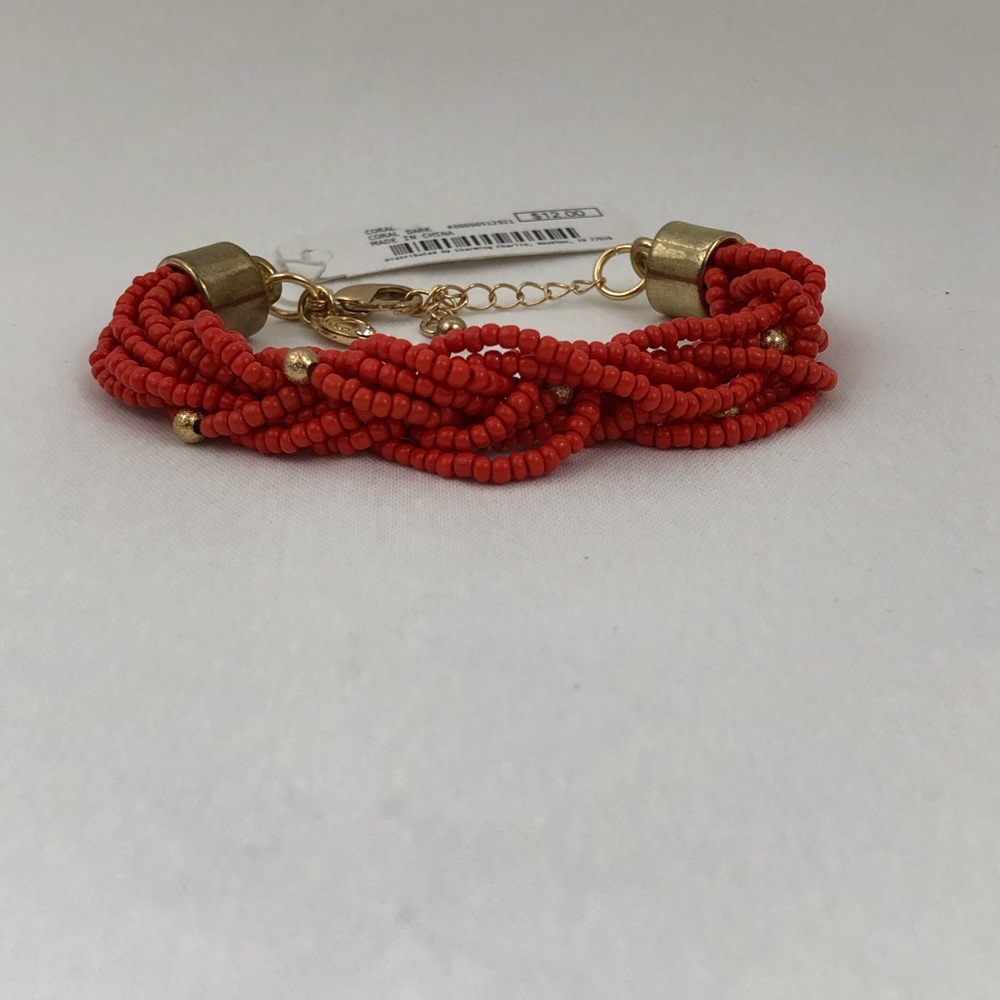 NWT. ORANGE WITH GOLD ACCENT BRACELET